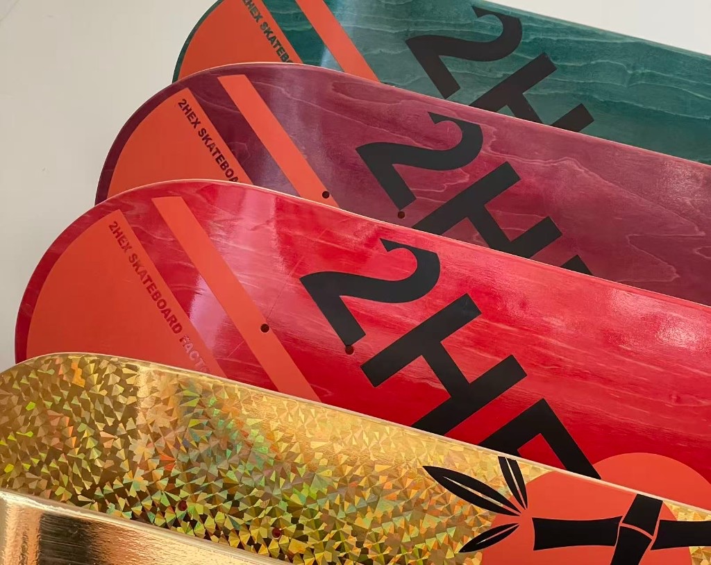 2HEX skateboard manufacturer deck samples metallic gold foil
