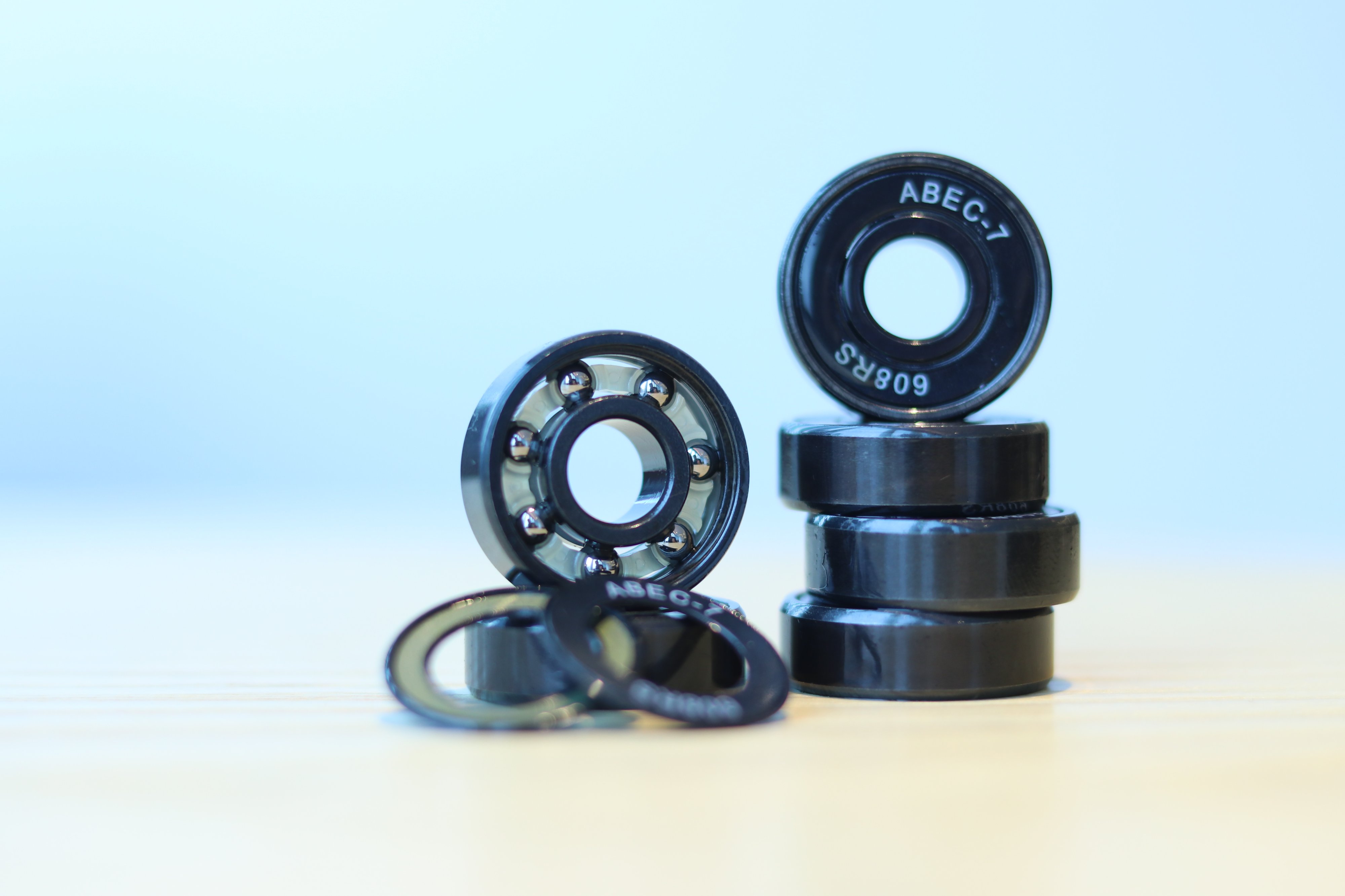 2hex skateboard bearings with open shield silver balls and white retainer front