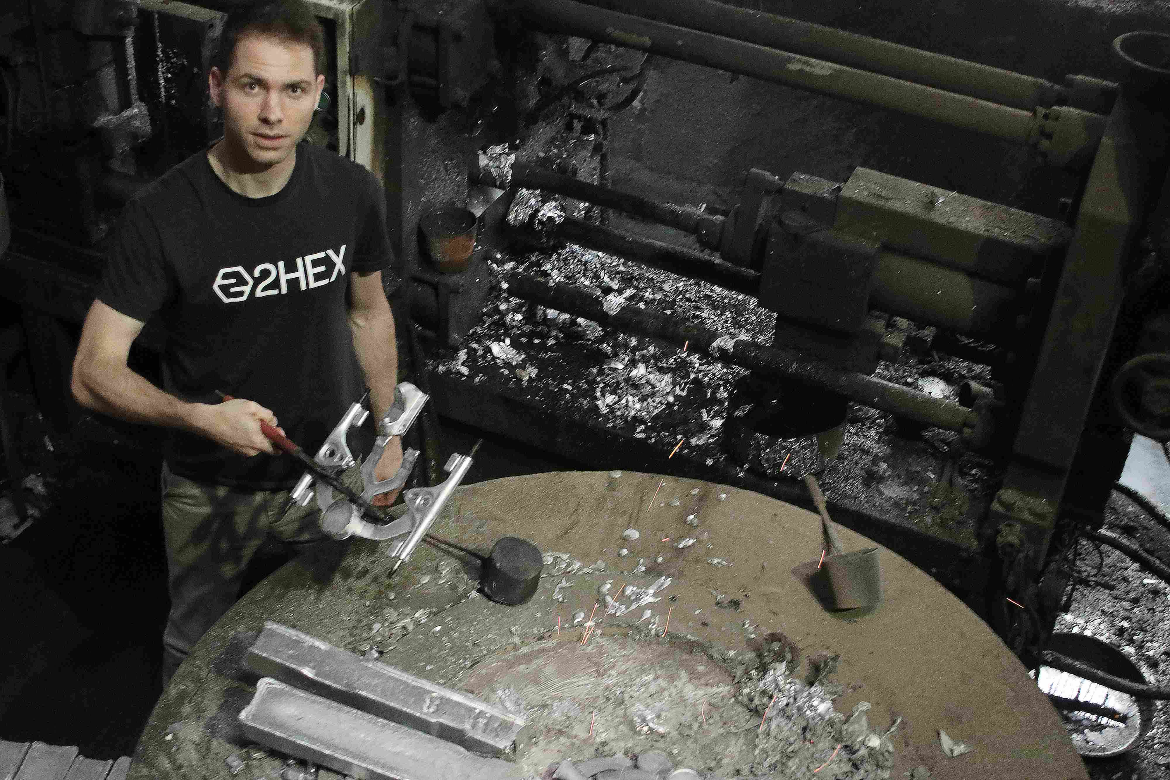 working on the skateboard truck production