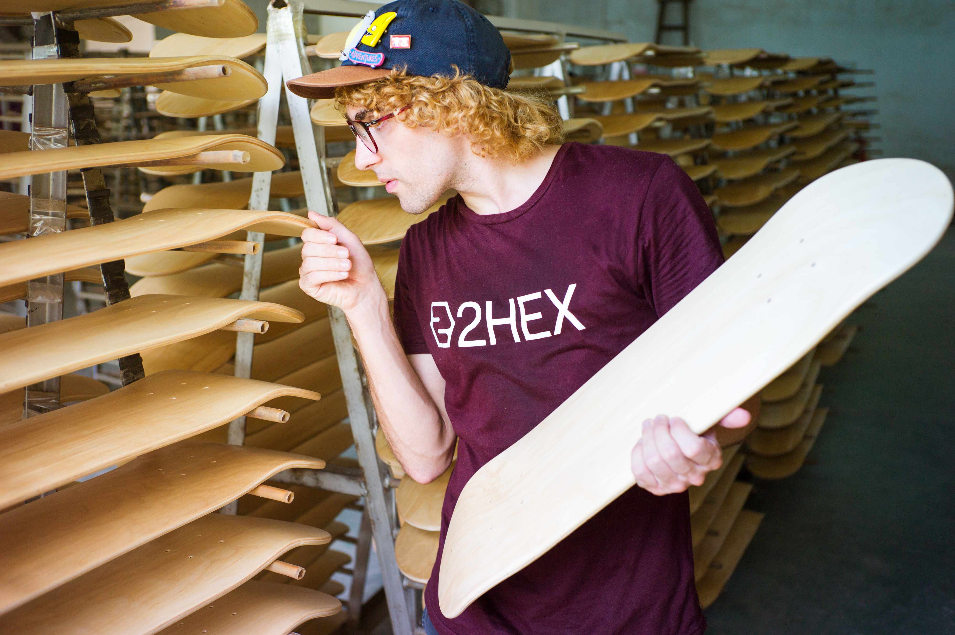 checking skateboard quality at 2hex skateboard production