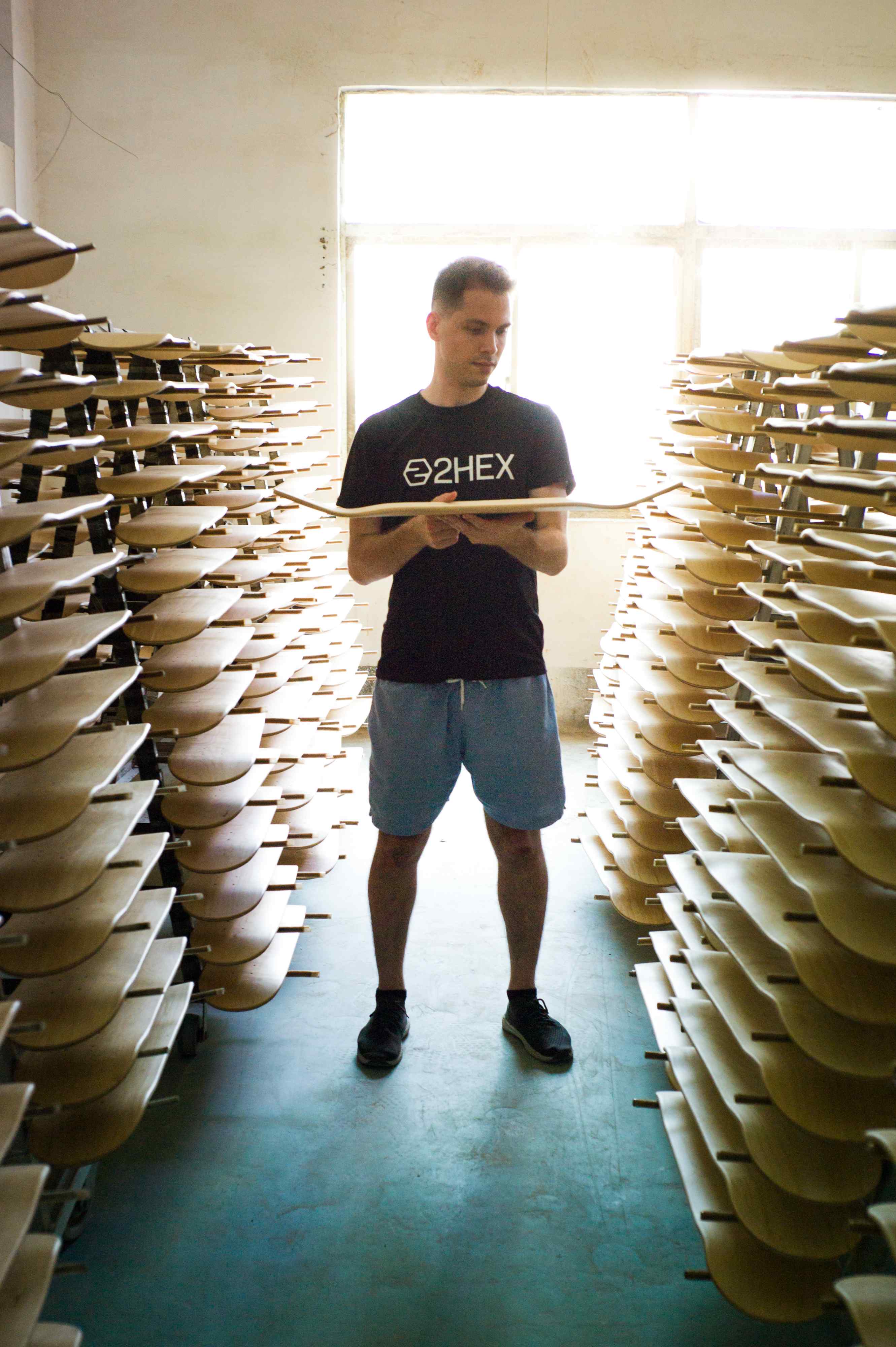 skateboard deck drying room with production manager