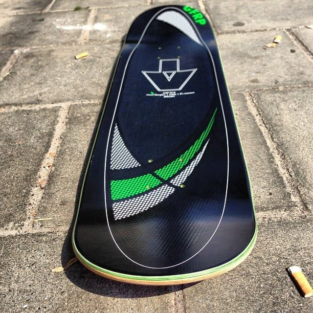 top layer of a 2hex fiberglass skateboard in sunlight