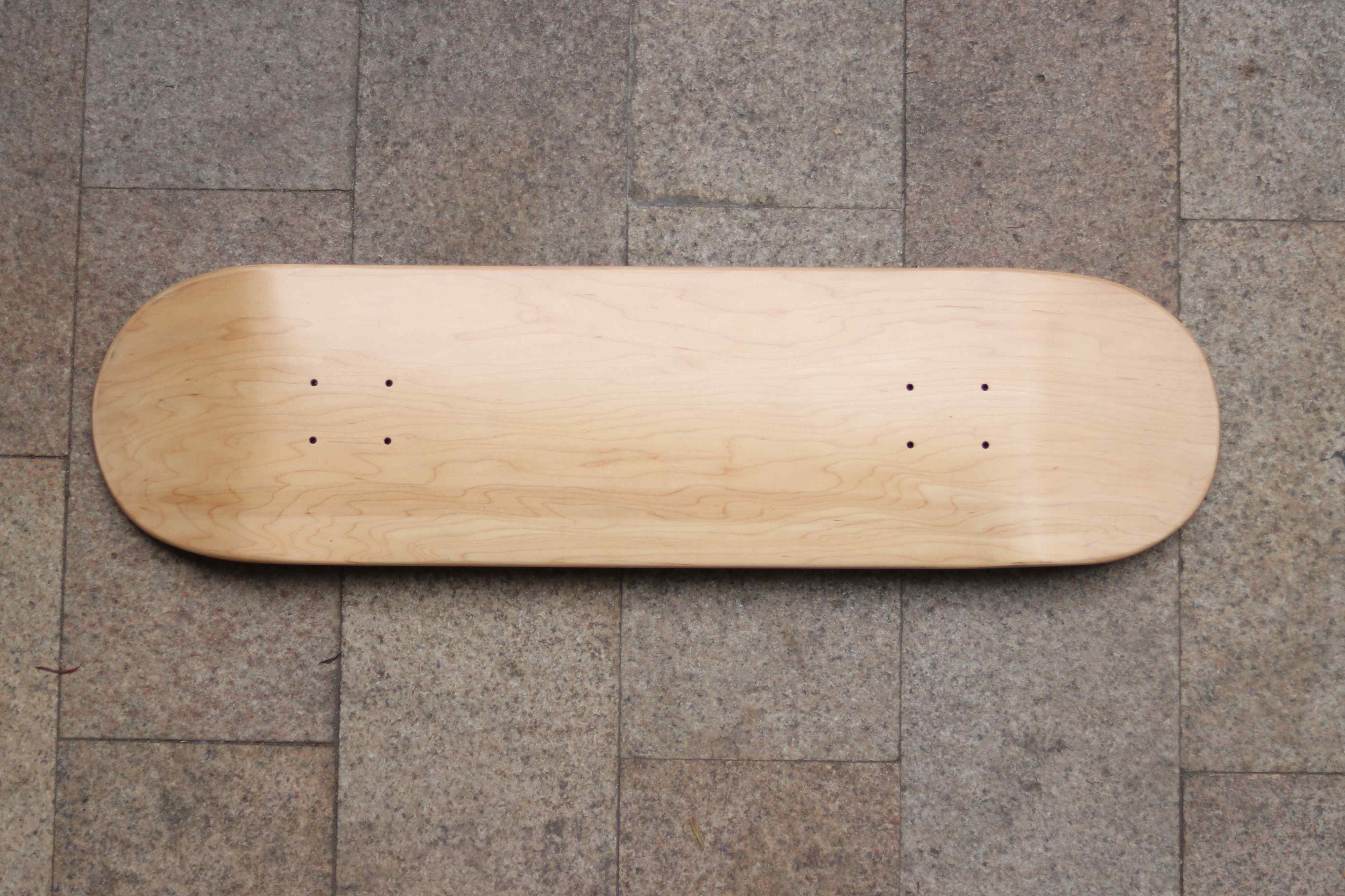 blank skateboard deck with wood grain