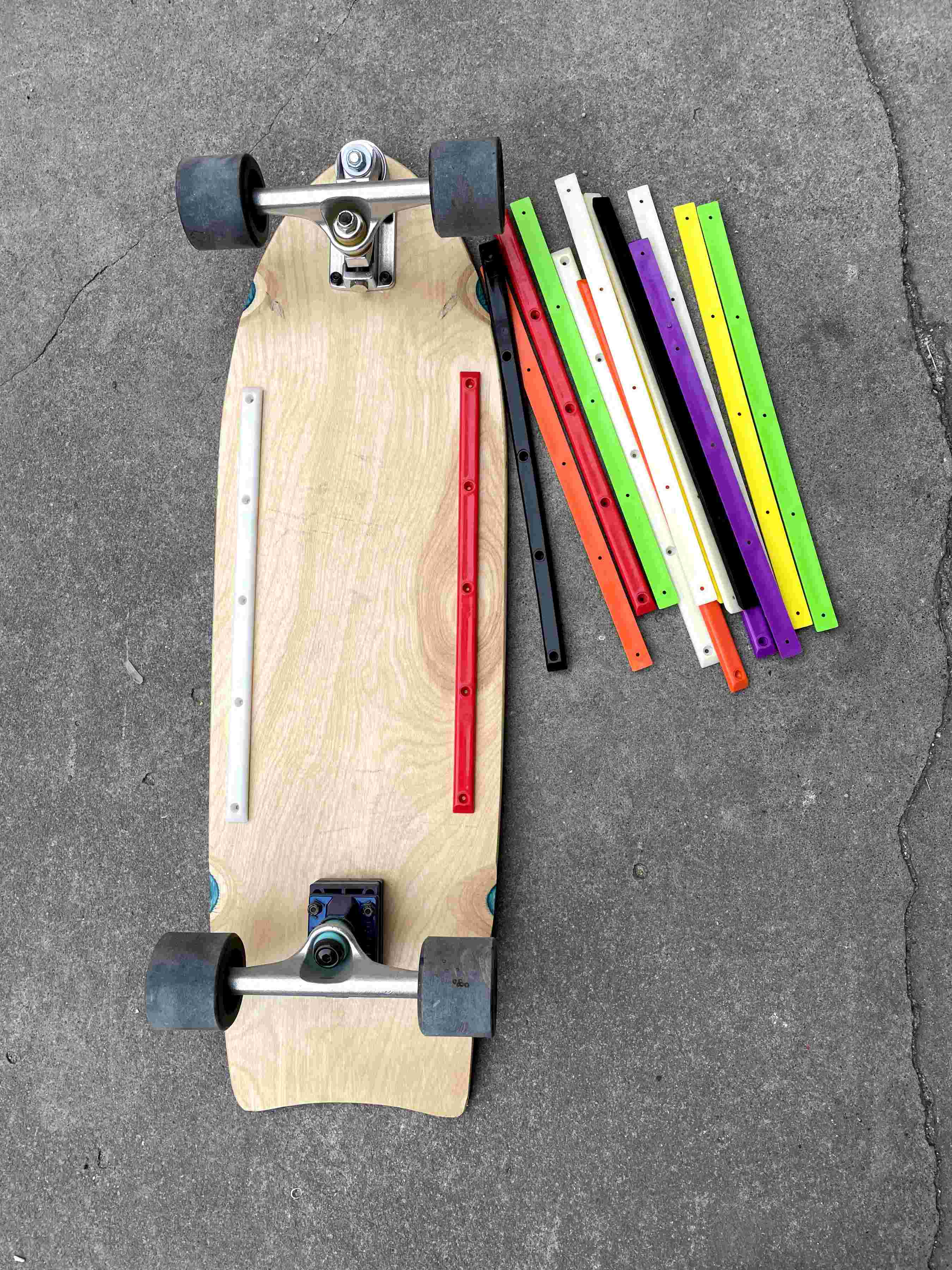skateboard boardslide rails samples on a surfskate skateboard