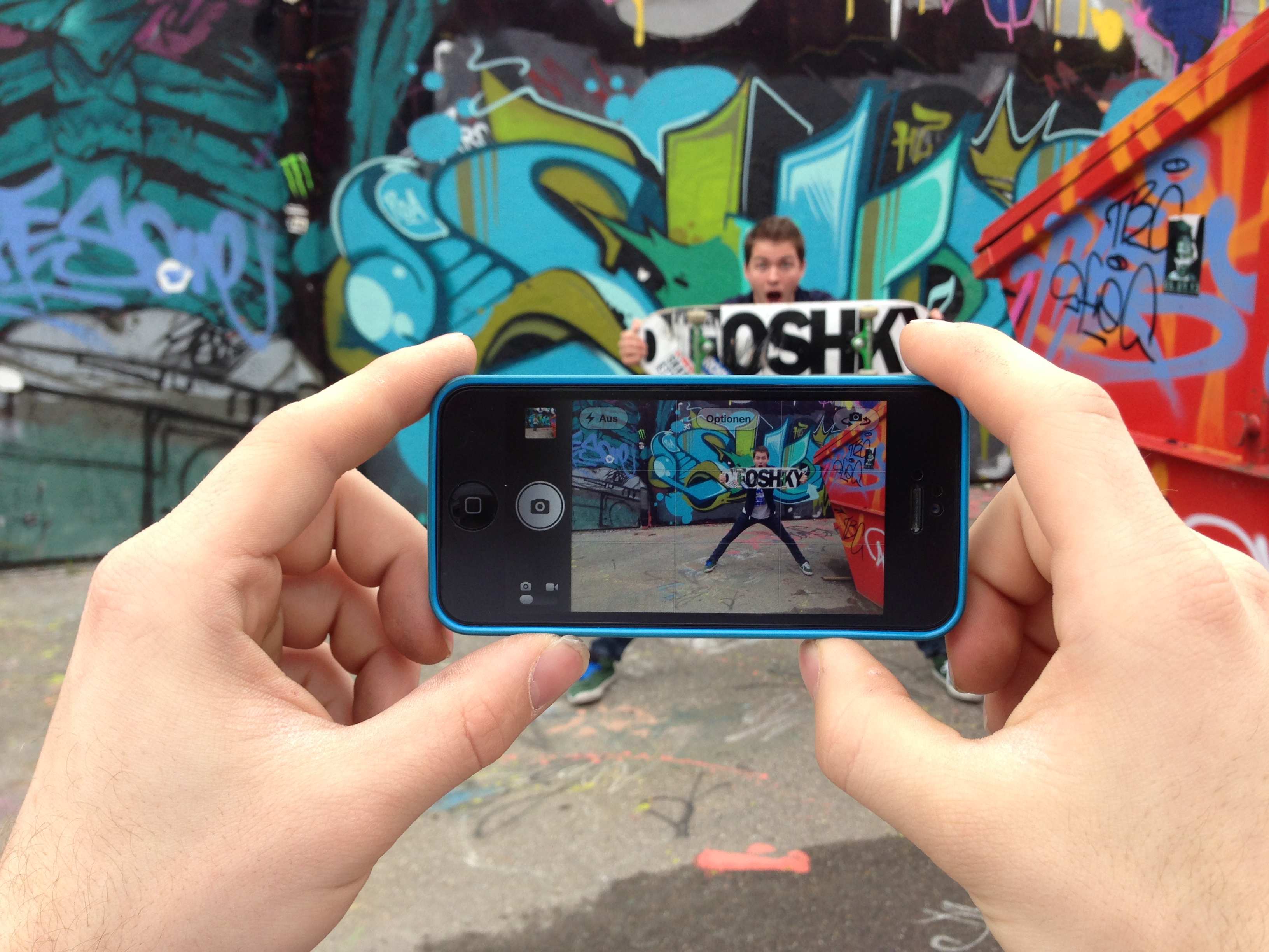 iphone photo of droshky deck with graffiti background
