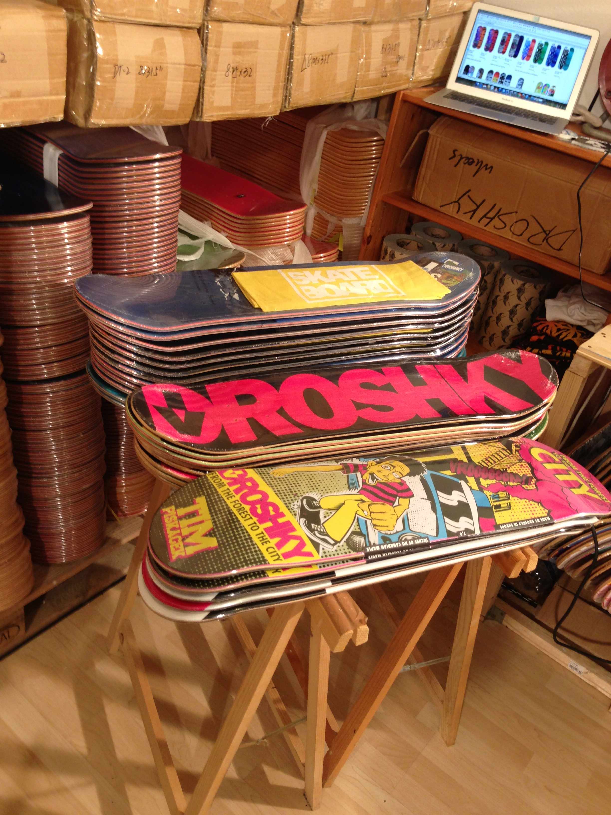 droshky skateboard decks in the shop warehouse