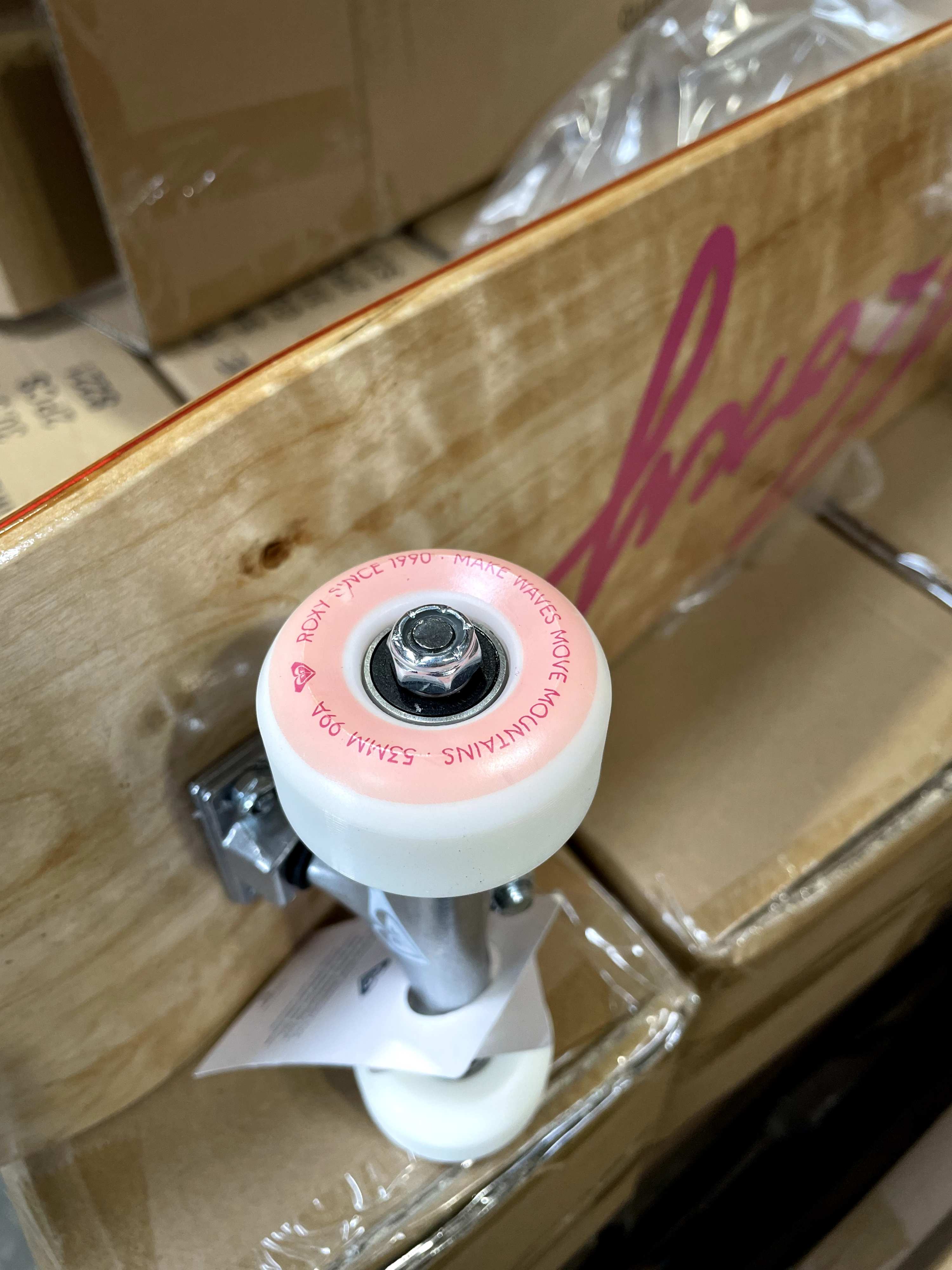 complete skateboard close up of wheels assembled