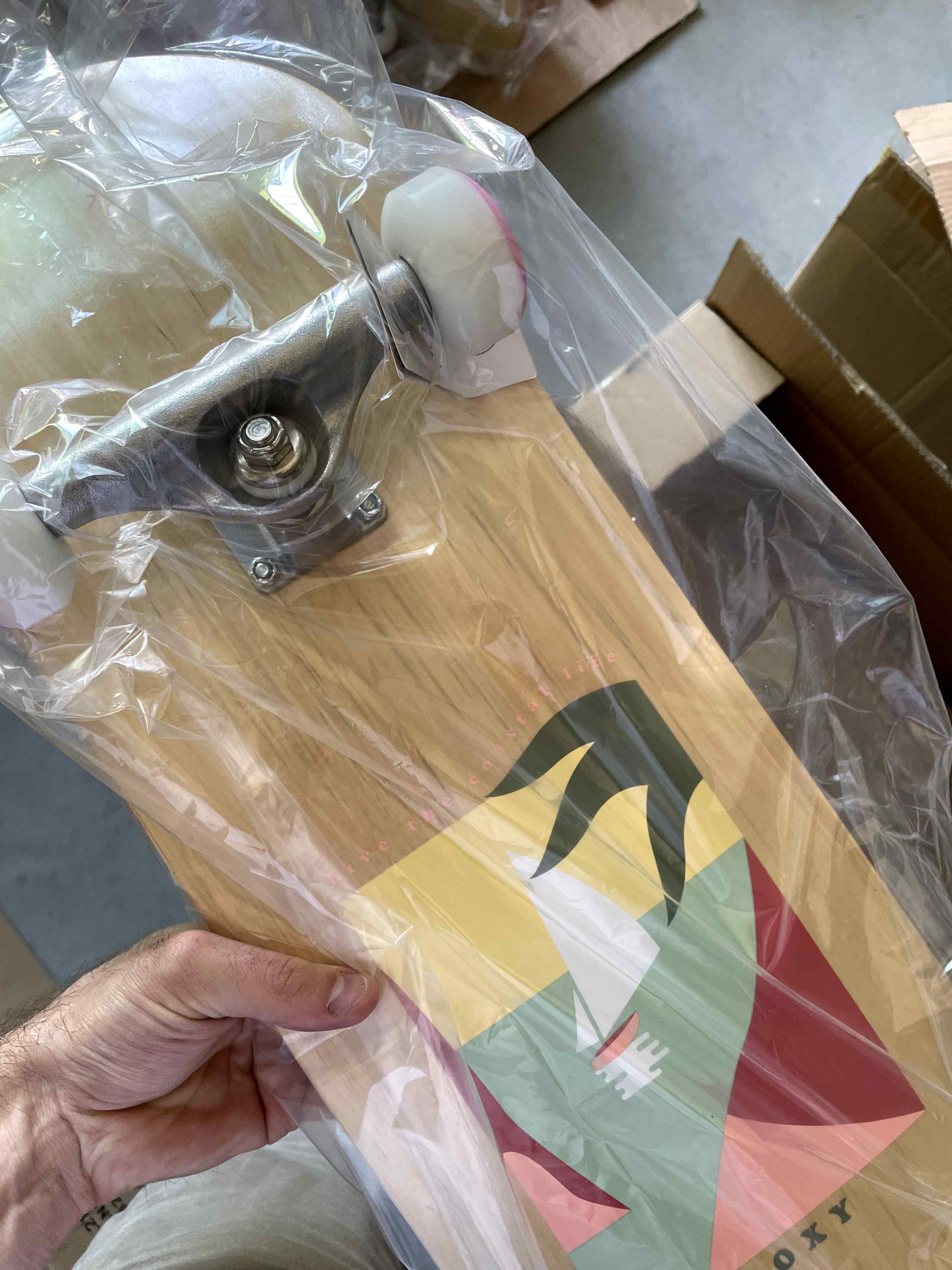 plastic wrapped complete skateboard deck