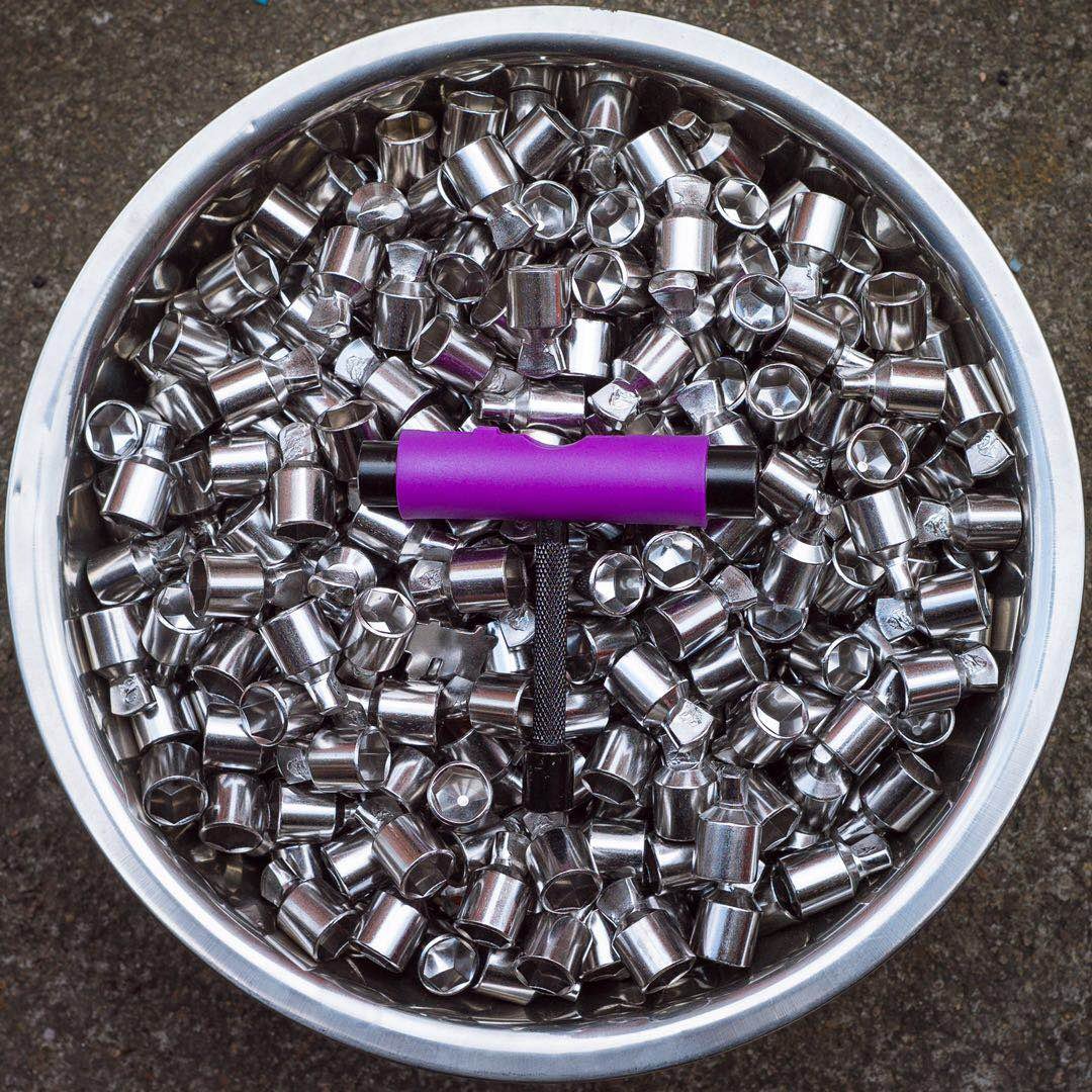 purple t tool on top of material