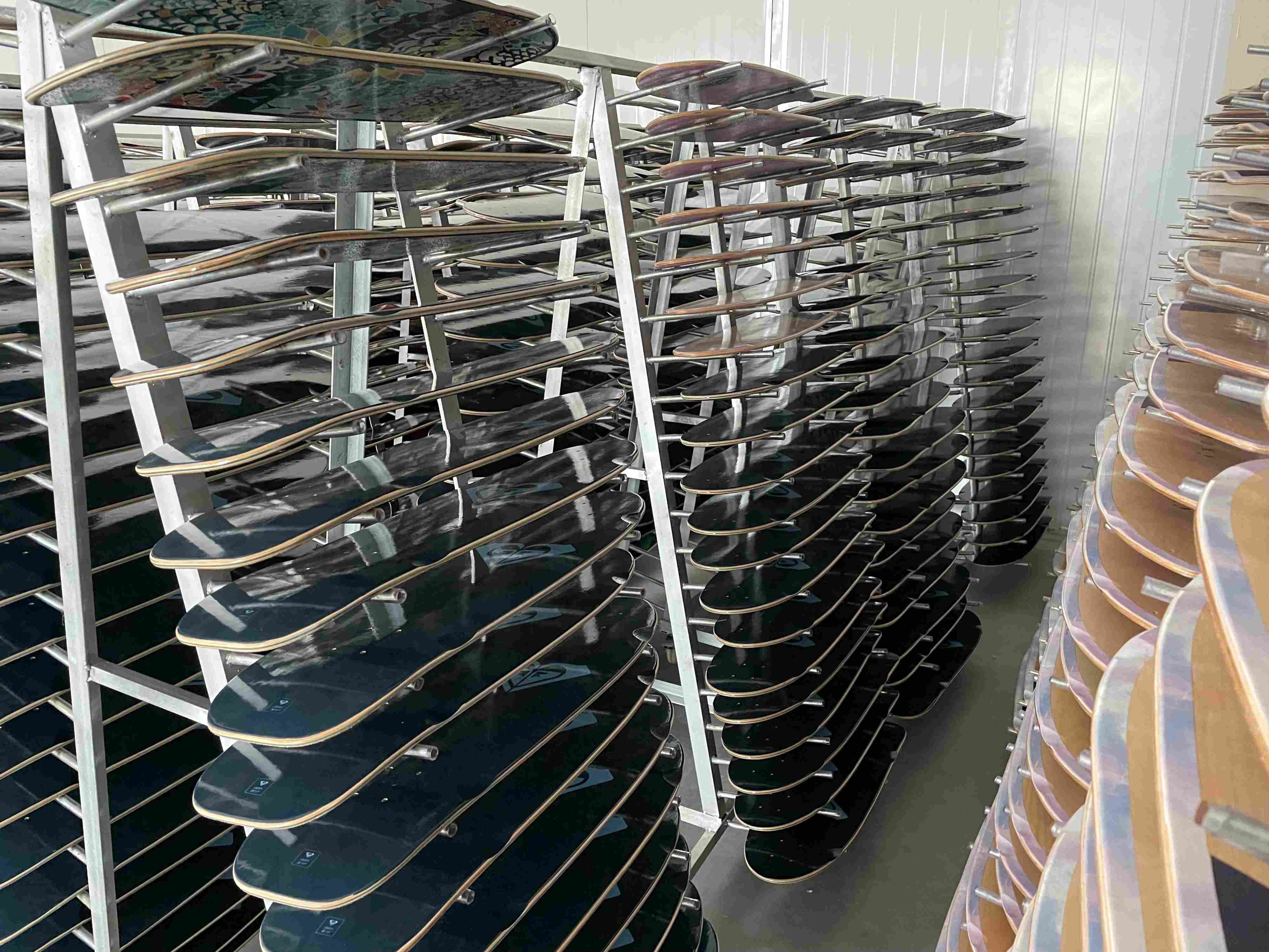 skateboard decks drying after big production