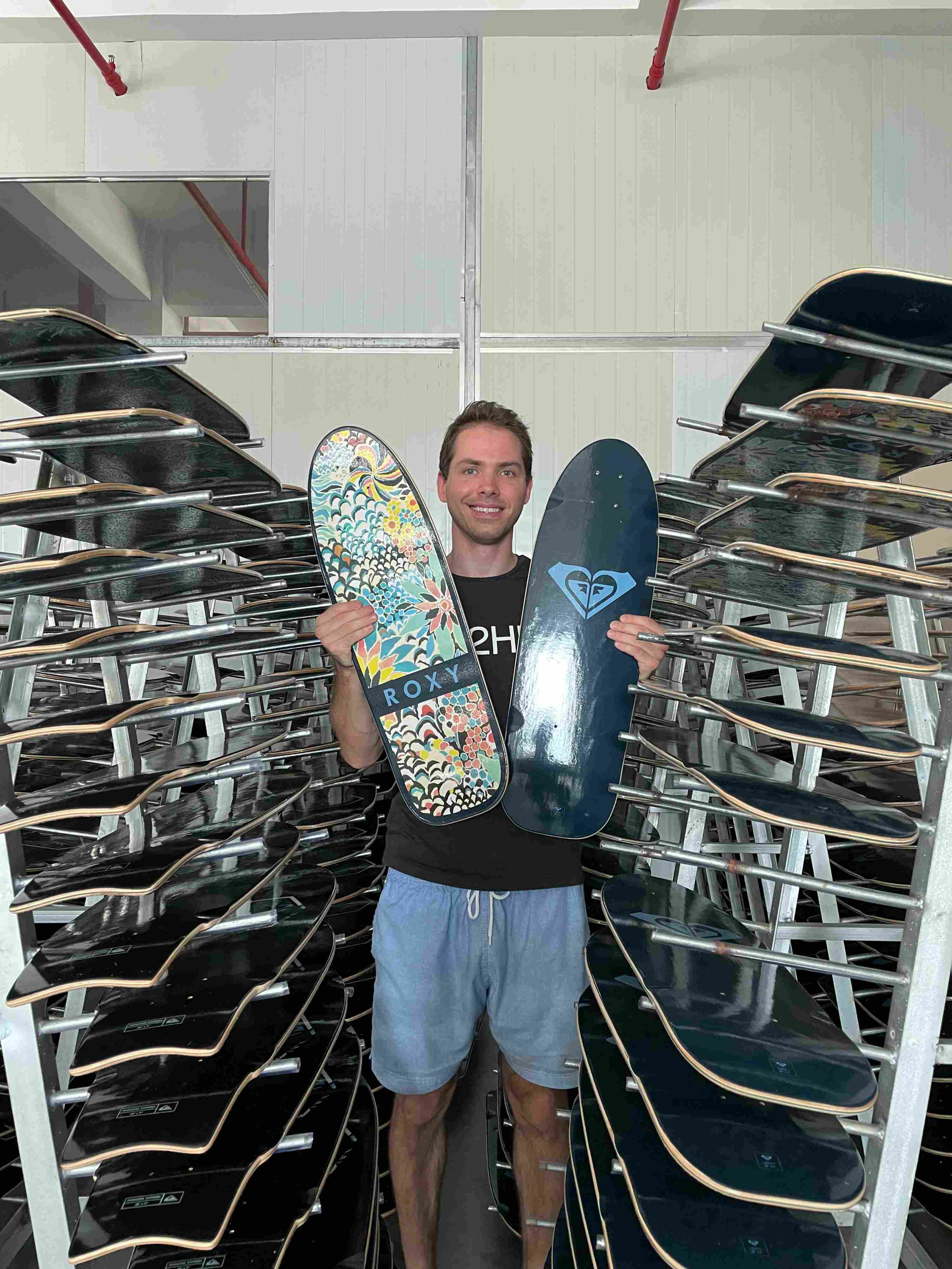 checking quality at skateboard deck production