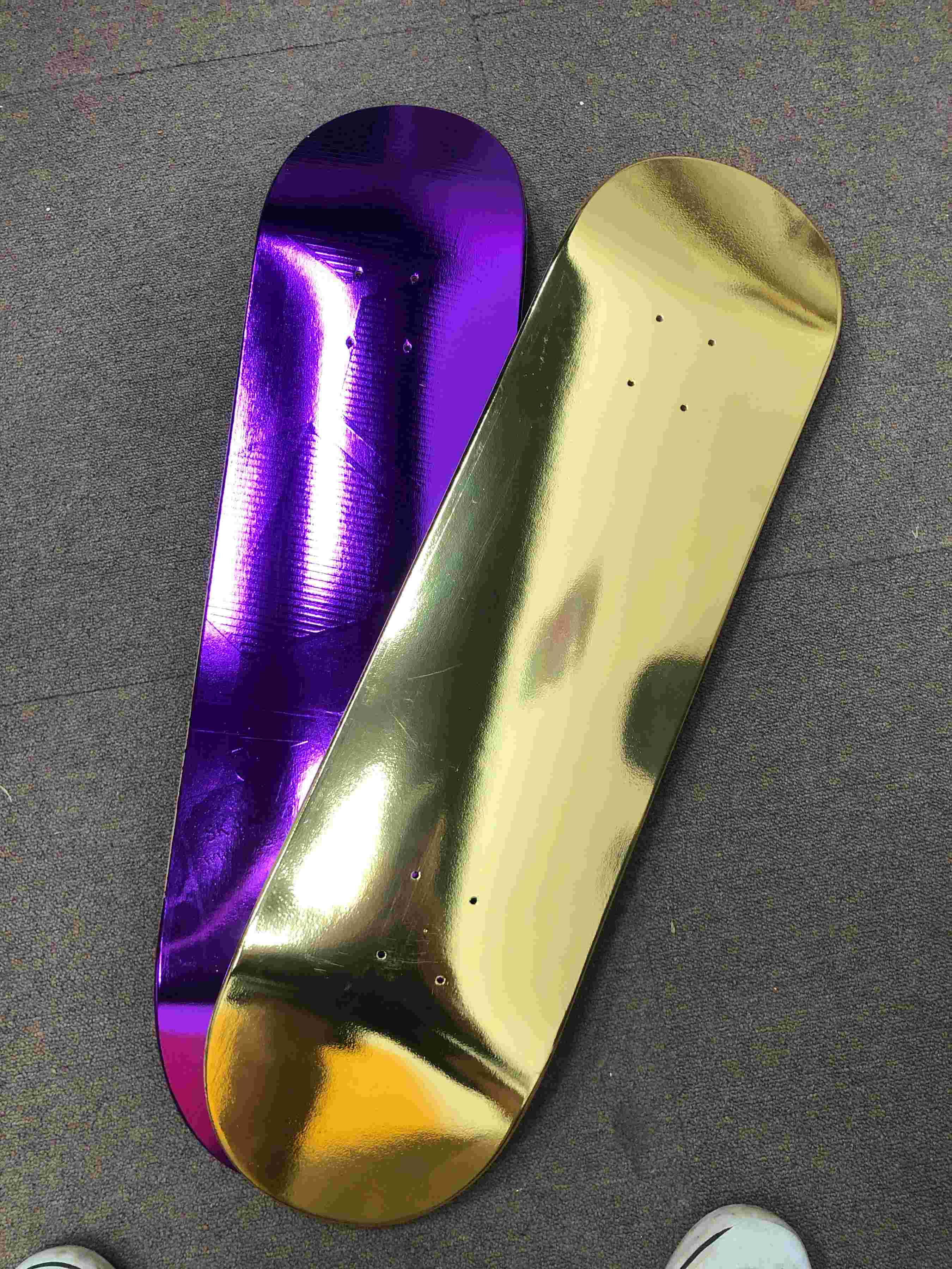 purple and gold heat transfer foils on two decks