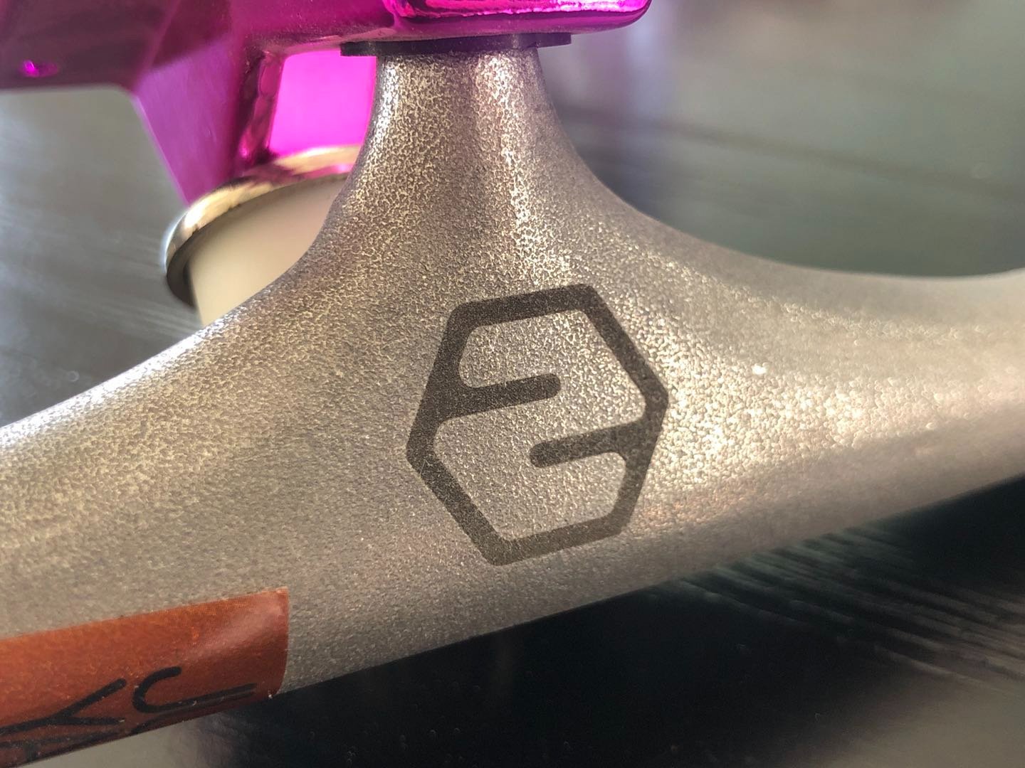 hanger reference photo showing laser printing with 2hex skateboard manufacturer