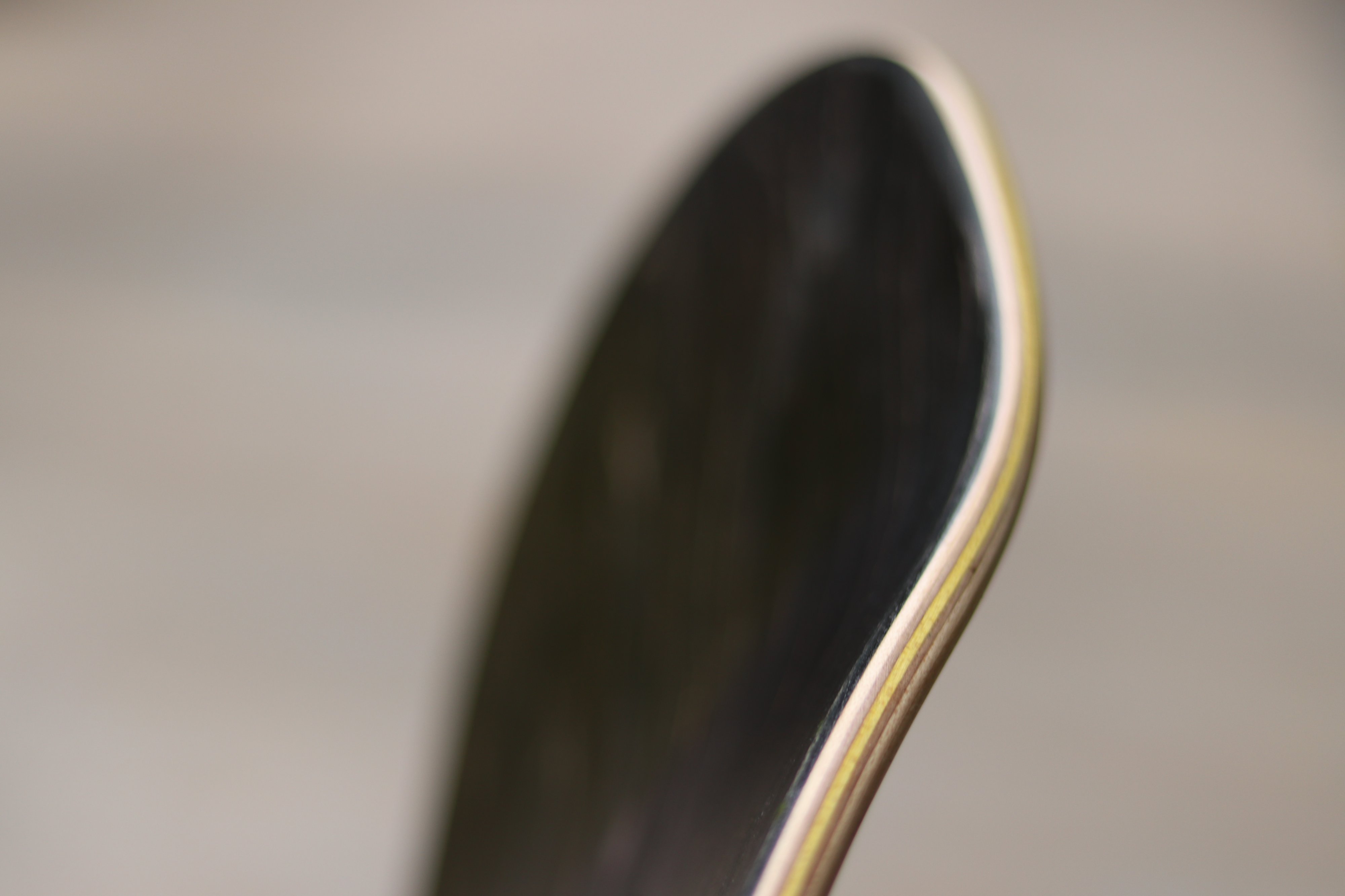 close up of a skateboard decks veneers