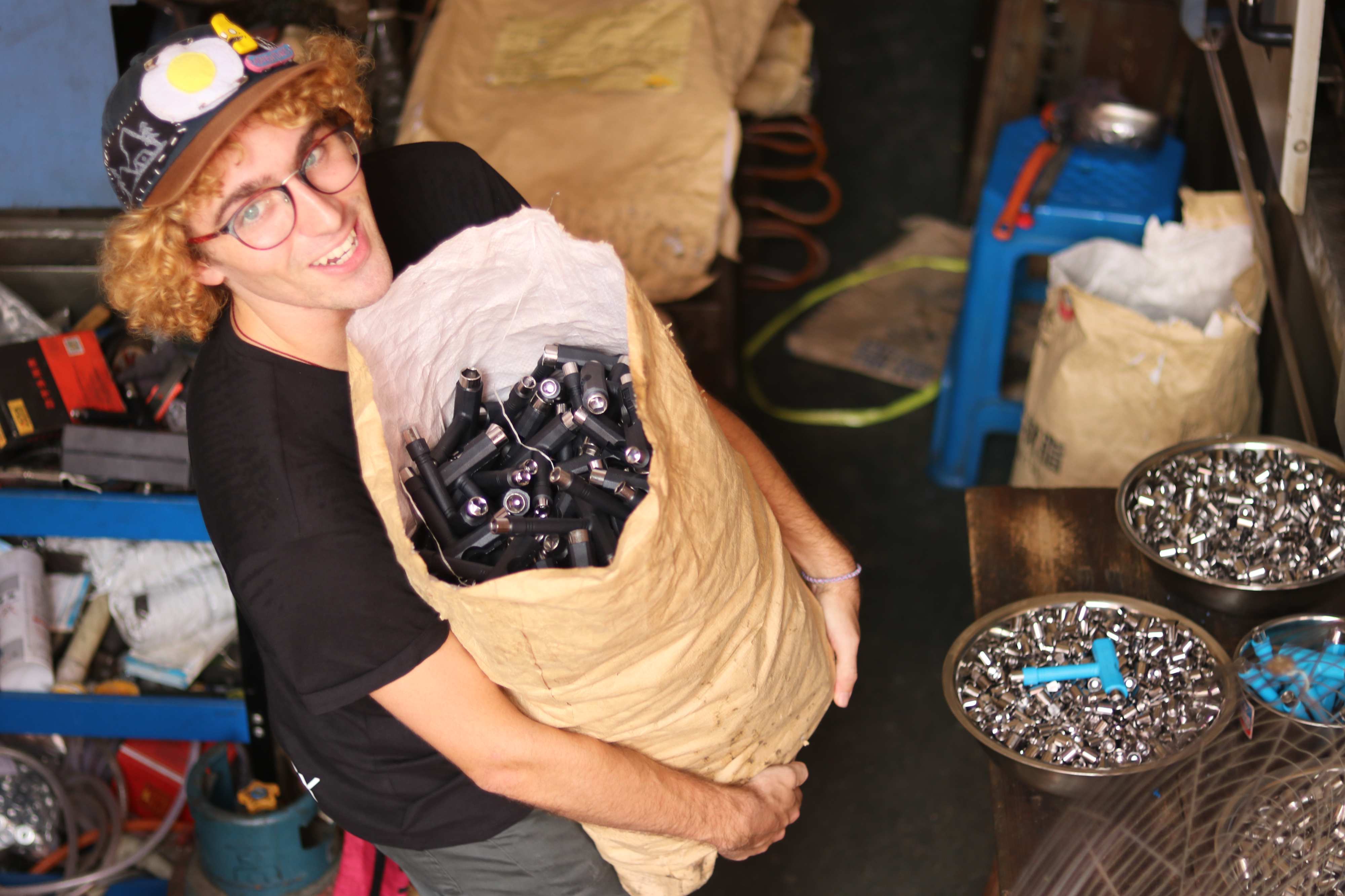 production manager checking on the skateboard t tool factory production
