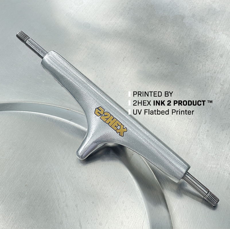 Photo of skateboard trucks printed on by 2HEX Ink 2 Product UV Flatbed Printer